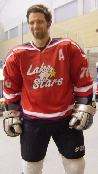 A blurry shot of Edward in his hockey gear.